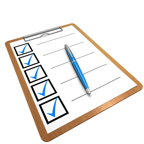 Clipboard with a checklist and a blue pen